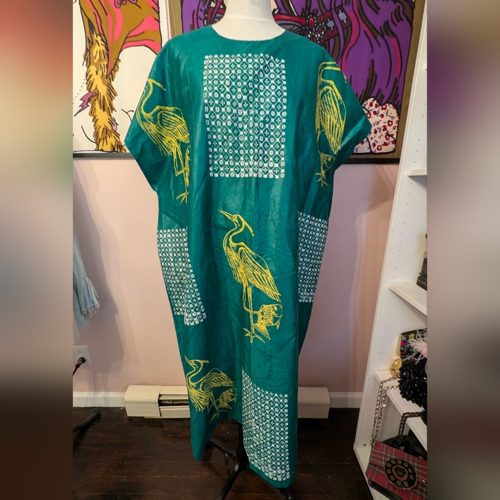 Vibrant Teal Maxi Dress with Yellow Heron Design